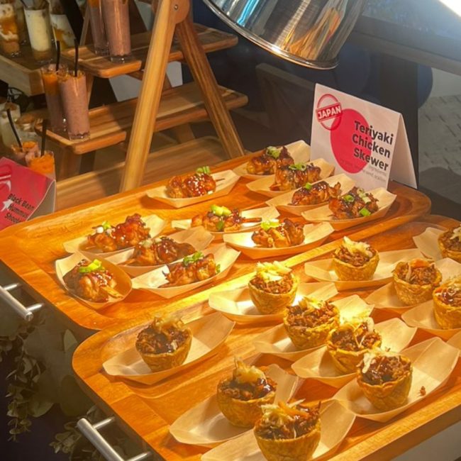 Elegant multicultural wedding catering setup in Naples, Florida, featuring chef-styled Mediterranean appetizers and tropical decor.