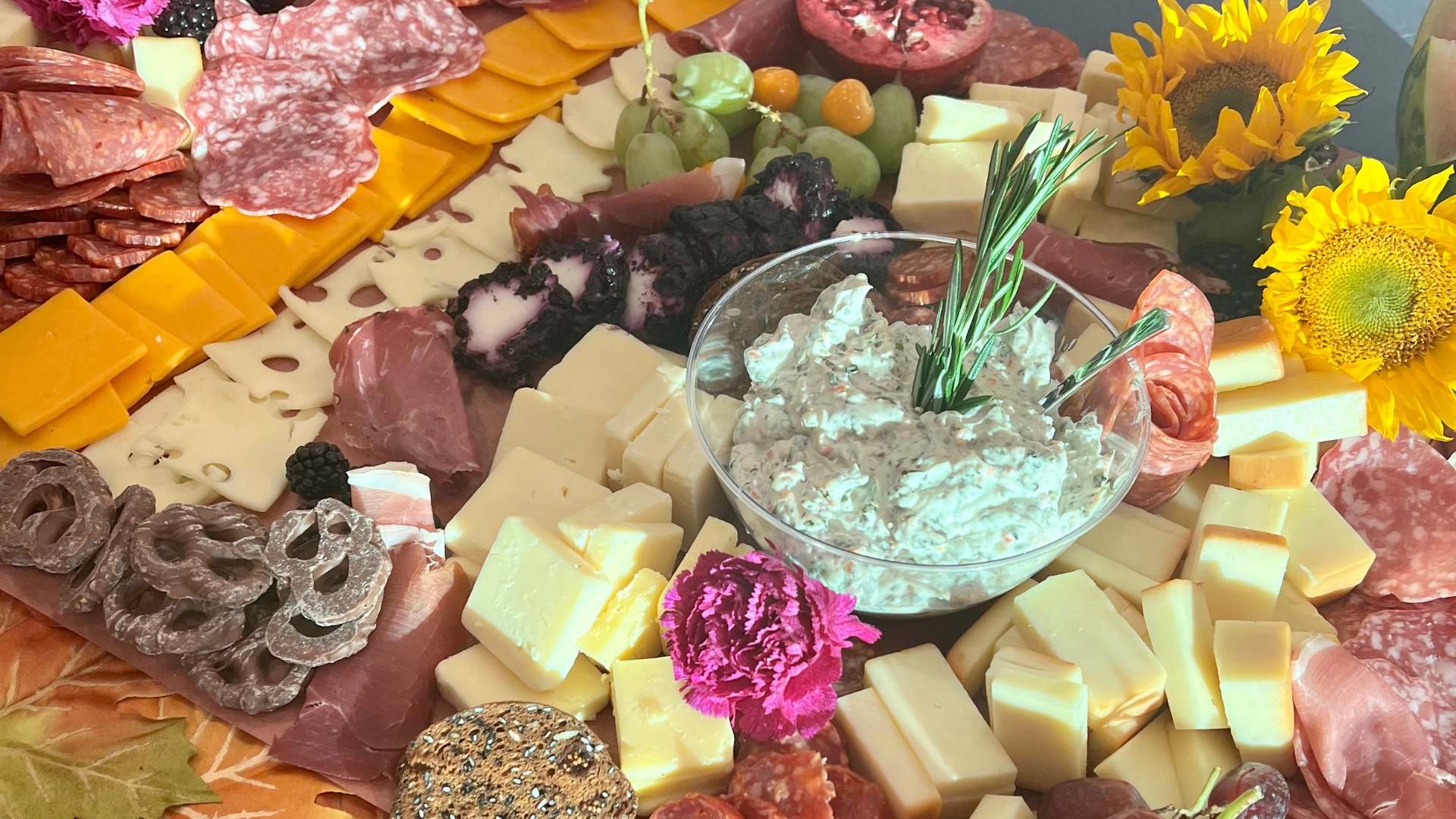Luxury catered outdoor wedding reception in Naples, Florida, showcasing international-inspired dishes and elegant table settings.