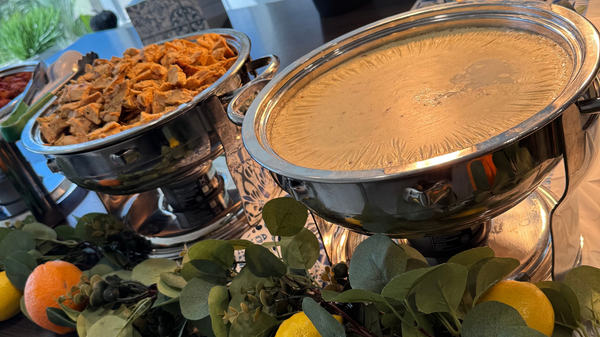 Elegant holiday catering presentation with chef-curated seafood and seasonal sides at a waterfront home in Naples, Florida