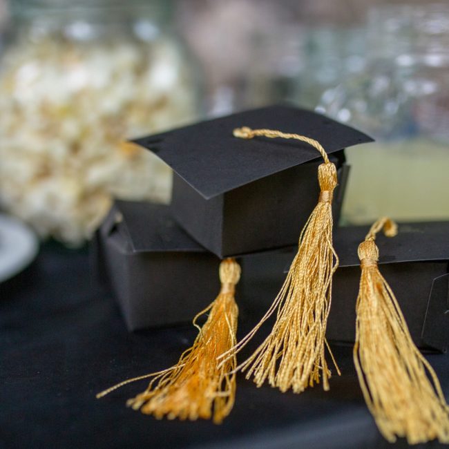 Backyard graduation catering Naples FL by Creative Catering Naples featuring elegant buffet tables, graduation-themed décor, chef-attended stations, and outdoor family celebration in Naples Florida.