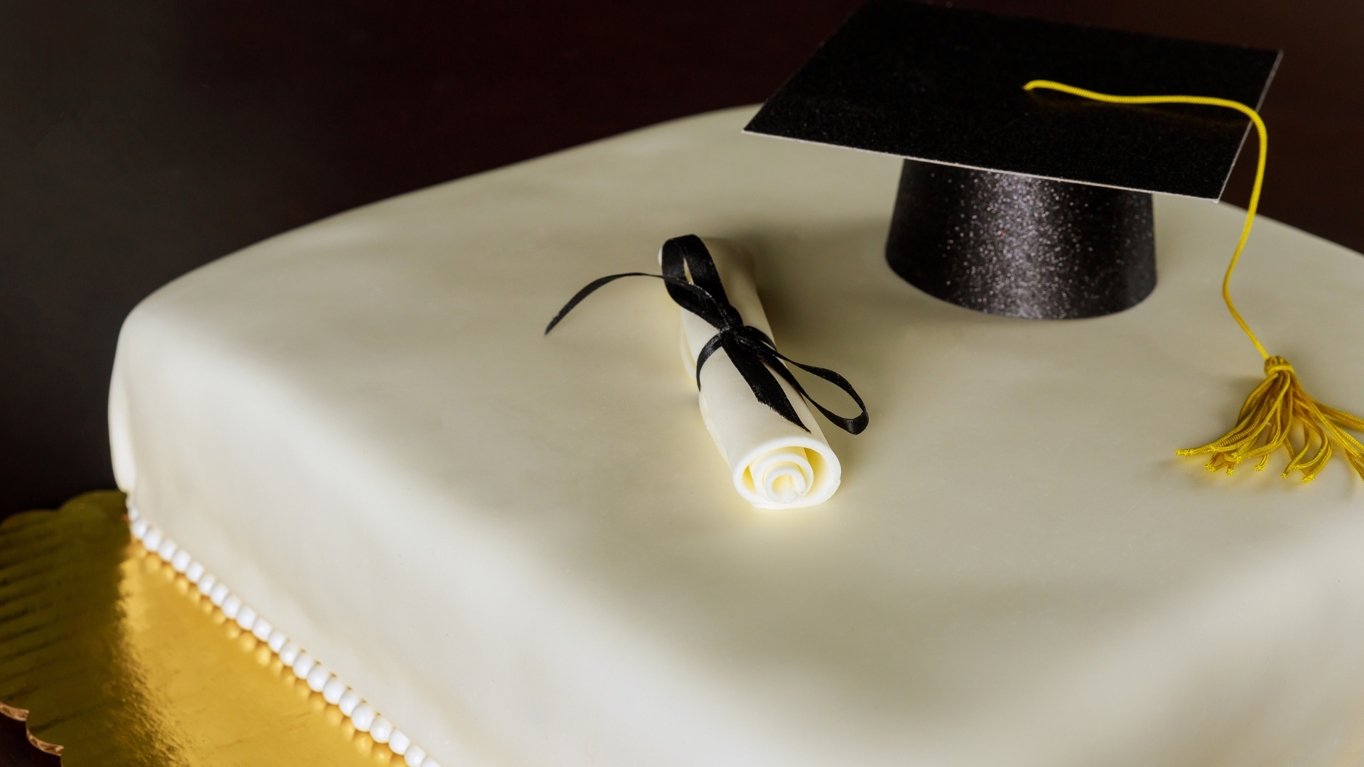 Luxury graduation dessert catering Naples Florida by Creative Catering Naples featuring elegant dessert displays, custom graduation cakes, cupcakes, cookies, and sweets for parties in Naples FL.