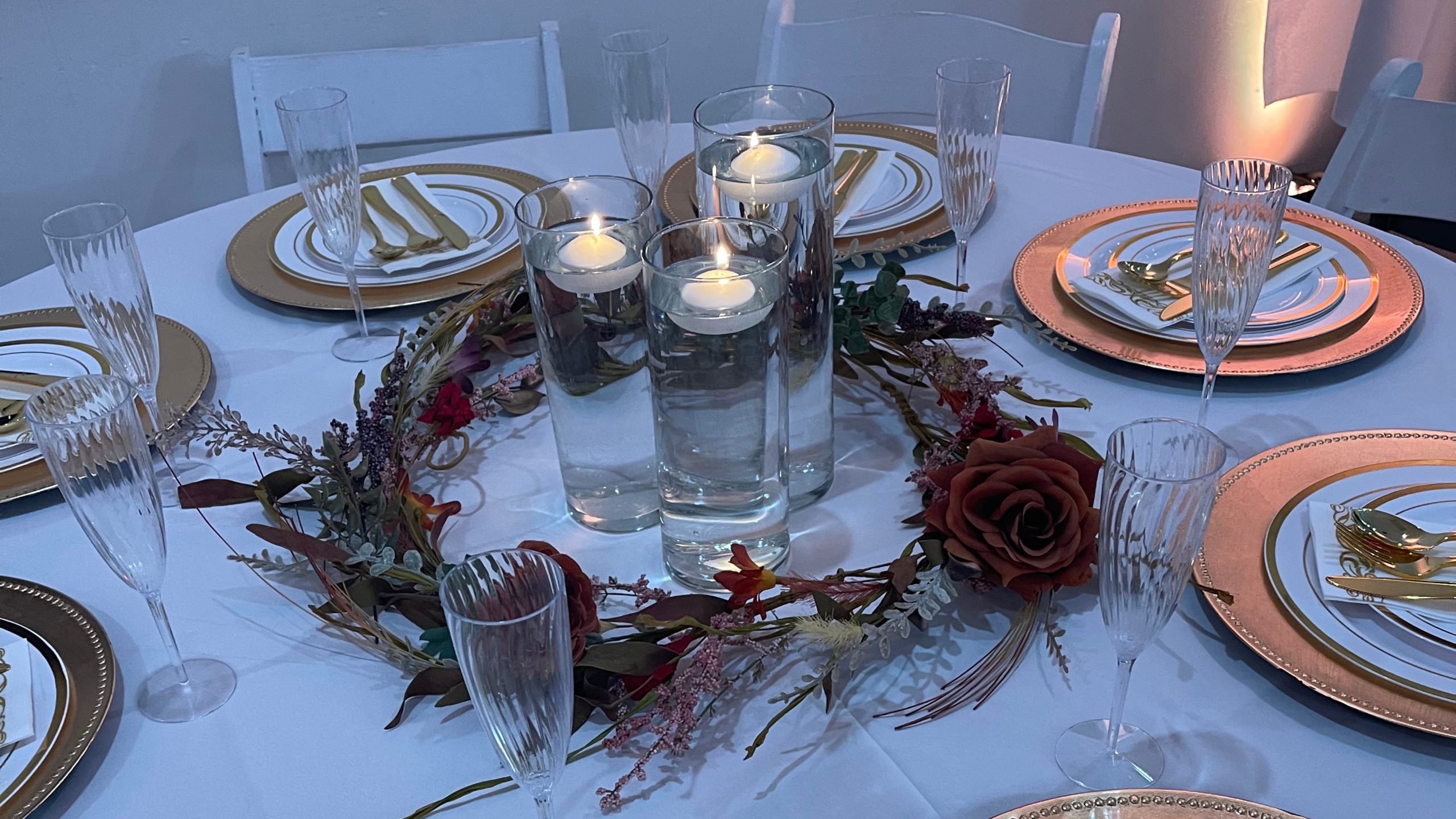 A romantic beachside dinner setup with gourmet dishes at sunset in Naples, FloridaA romantic beachside dinner setup with gourmet dishes at sunset in Naples, Florida