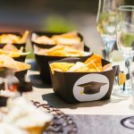 Luxury graduation catering Naples Florida by Creative Catering Naples featuring elegant buffet stations, gourmet appetizers, graduation cake display, and upscale outdoor celebration setup.