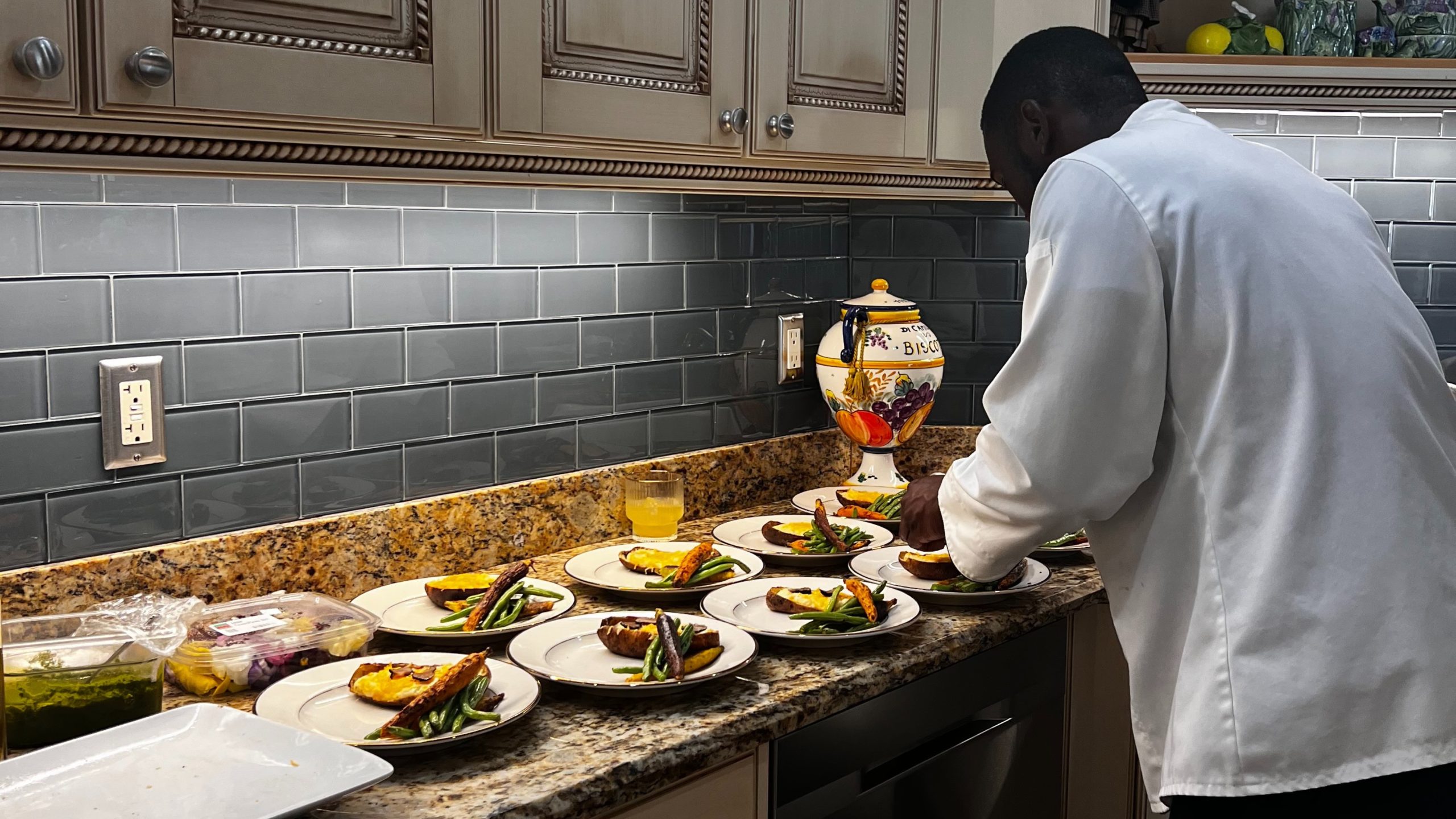 Chef preparing gourmet dishes at a luxury catered event in Naples, Florida