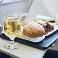 Chef-prepared in-flight catering meal plated in premium cabin-safe packaging for private jet service